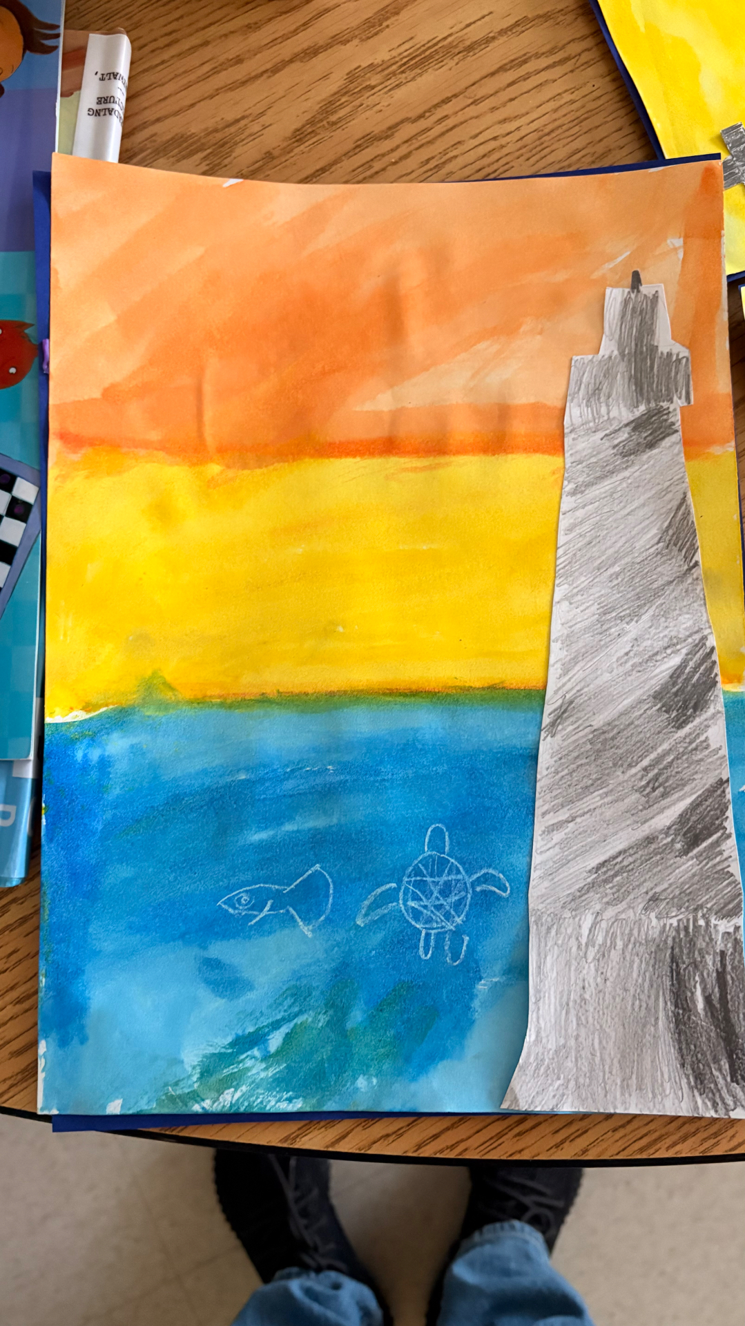 Watercolor lighthouse scene with fish and turtle details in the ocean
