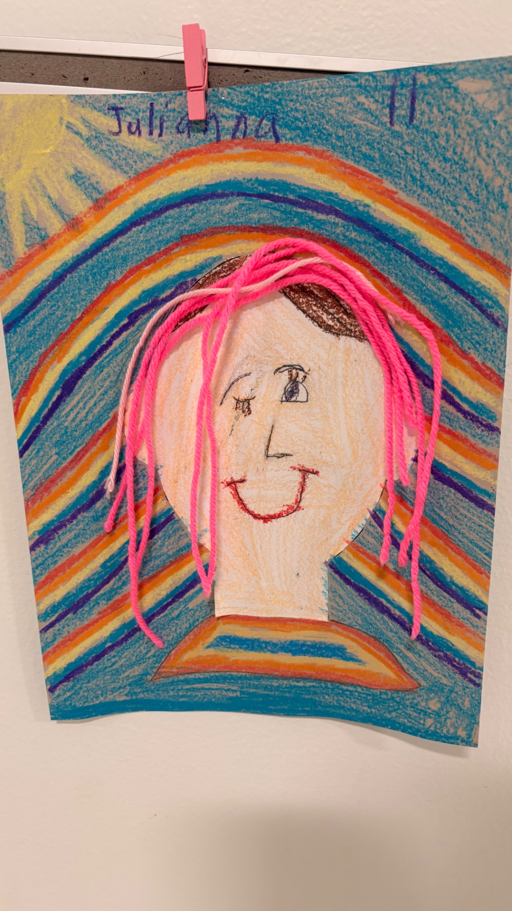 Mixed-media self portrait with pink yarn hair, by Julianna